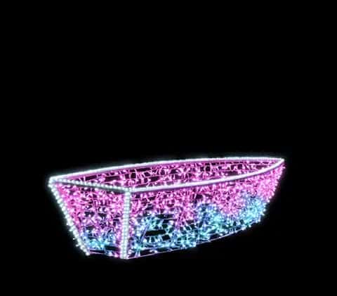 Siyah fonda pembe ve turkuaz LED kaplı kayık figürü