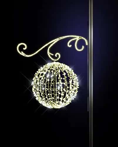 Koyu fonda uzun kıvrımlı sarı konsol, altında sıcak beyaz LED küre