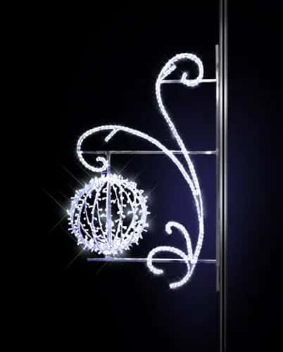 Koyu fonda uzun spiral beyaz konsol, altında beyaz LED küre